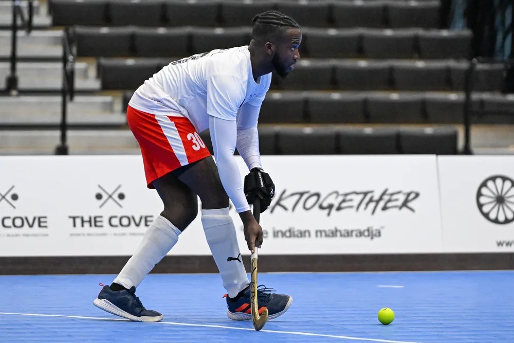 Trinidad and Tobago's Lyndell Byer moves with the ball during the Pan American Indoor Hockey match against Argentina on Thursday night in Canada. (Photo credit - Pan American Hockey Federation) (Image obtained at tt.loopnews.com)