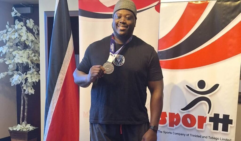 Akeem Stewart after returning home on October 6. PHOTO COURTESY SPORTT - SPORTT (Image obtained at newsday.co.tt)